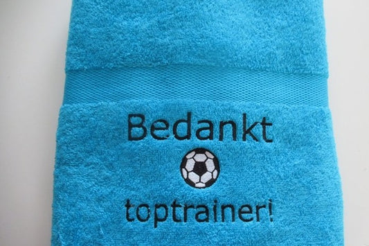 Trainer bedankt cadeau