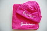 spuugdoek en muts roze