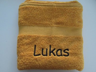 okergele handdoek met naam