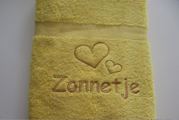 Badlaken met naam en afbeelding
