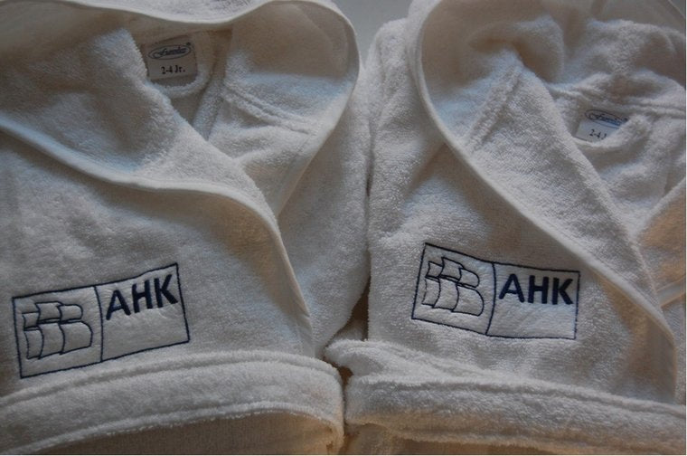 Badjas met naam en logo