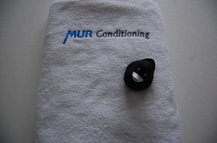 Badlaken of douchlaken met logo