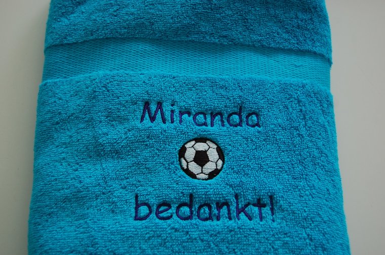 Trainer bedankt cadeau