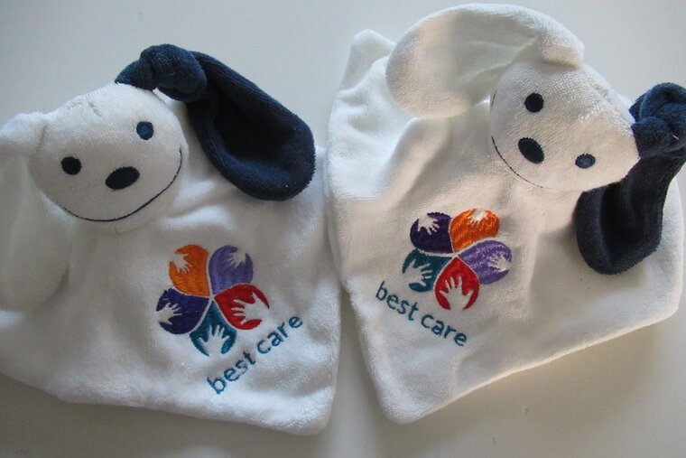 Knuffelpoppetje met Logo